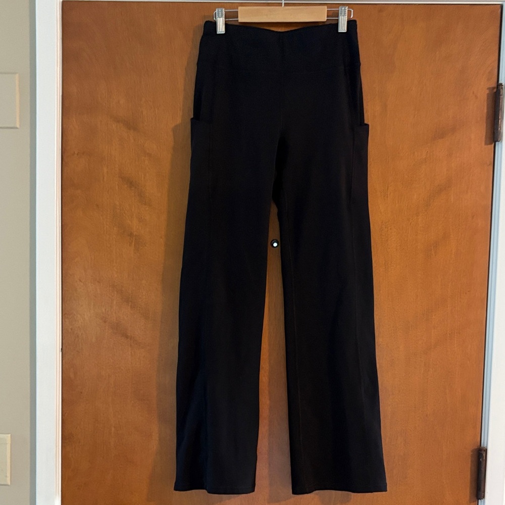 Iuga black workout pants, bootcut  leg small with side pockets